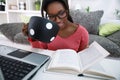 Student girl drinking coffee and learning Royalty Free Stock Photo