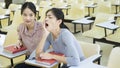 Student girl feel sleepy in the classroom.