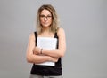 Student girl with glasses holding a book Royalty Free Stock Photo