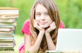 Student girl on grass with laptop computer Royalty Free Stock Photo