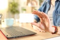 Student girl hand showing blank credit card to camera Royalty Free Stock Photo