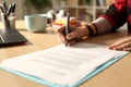 Student girl hand signing contract at night Royalty Free Stock Photo