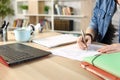 Student girl hands doing exam at home Royalty Free Stock Photo