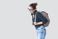 Student girl with heavy schoolbag Royalty Free Stock Photo