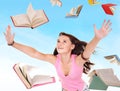 Student girl holding pile of books. Royalty Free Stock Photo