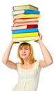 Student girl holding stack color books over the head. Isolated Royalty Free Stock Photo