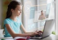 student girl with laptop learning online at home Royalty Free Stock Photo