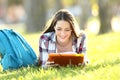 Student girl learning reading notes in a campus