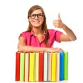 Student girl with pile book showing thumb up Royalty Free Stock Photo