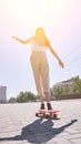 Student girl at pink skateboard. Local city traveller. Staycation lifestyle.