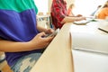 Student girl with smartphone texting at school Royalty Free Stock Photo