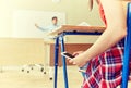 Student girl with smartphone texting at school Royalty Free Stock Photo