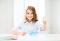 Student girl studying at school Royalty Free Stock Photo