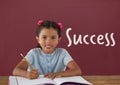 Student girl at table against red blackboard with success text Royalty Free Stock Photo