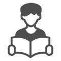 Student guy with magazine solid icon, learners literature concept. Vector graphics. Man with book in hands, education Royalty Free Stock Photo