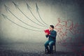 Student guy reads a book, seated on chair. Information processing concept as mess lines comes through head and transform into Royalty Free Stock Photo