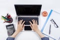 Student hands use laptop on desk