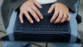 Student hands working keyboard outdoor closeup. Unknown man typing laptop device Royalty Free Stock Photo