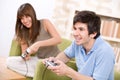 Student - happy teenagers play video game Royalty Free Stock Photo