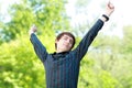 Student having break stretching arms Royalty Free Stock Photo