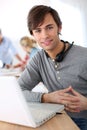 Student with headset in class