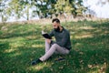 Student hipster bearded man reading a book Royalty Free Stock Photo