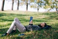 Student hipster bearded man reading a book outdoors Royalty Free Stock Photo