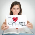 Student holding a sign with the words I hate school Royalty Free Stock Photo