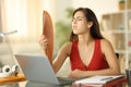 Student at home suffering heat stroke Royalty Free Stock Photo