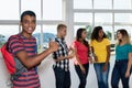 Student from India showing thumb up with international students Royalty Free Stock Photo