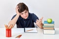 Student kid with ADHD is feeling confused and angry Royalty Free Stock Photo