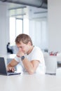 Student with laptop computer in library Royalty Free Stock Photo