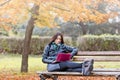 Student learns outdoors - using laptop