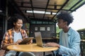 Student Life. Two students in school and working on laptop, checking social media. Teen student in university Use laptop and Table Royalty Free Stock Photo