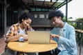 Student Life. Two students in school and working on laptop, checking social media. Teen student in university Use laptop and Table Royalty Free Stock Photo