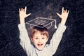 Student little boy and science background. child rejoices in scientific discovery Royalty Free Stock Photo