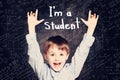 Student little boy and science background. child rejoices in scientific discovery Royalty Free Stock Photo