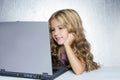 Student little school girl on laptop compute Royalty Free Stock Photo