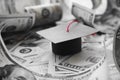 Student Loan Debt With College Graduation Cap On Money In Black & White Royalty Free Stock Photo