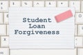 Student Loan Forgiveness message on ruled paper Royalty Free Stock Photo