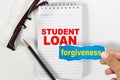 Student loan forgiveness, text words typography written on paper, life and educational Royalty Free Stock Photo