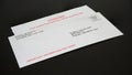 Student Loan Payments Resuming Notice in Envelope on Black Desk, left angled Royalty Free Stock Photo