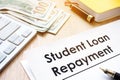 Student Loan Repayment form on a desk.