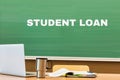 Student loan written on black board in classroom