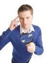 Student looking through a magnifying glass Royalty Free Stock Photo