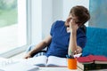 Student looking through the window Royalty Free Stock Photo