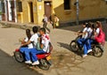 Student mass transport on motorcycles