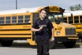 Student near the school bus Royalty Free Stock Photo