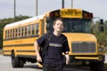 Student near the school bus Royalty Free Stock Photo
