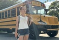 Student near the school bus Royalty Free Stock Photo